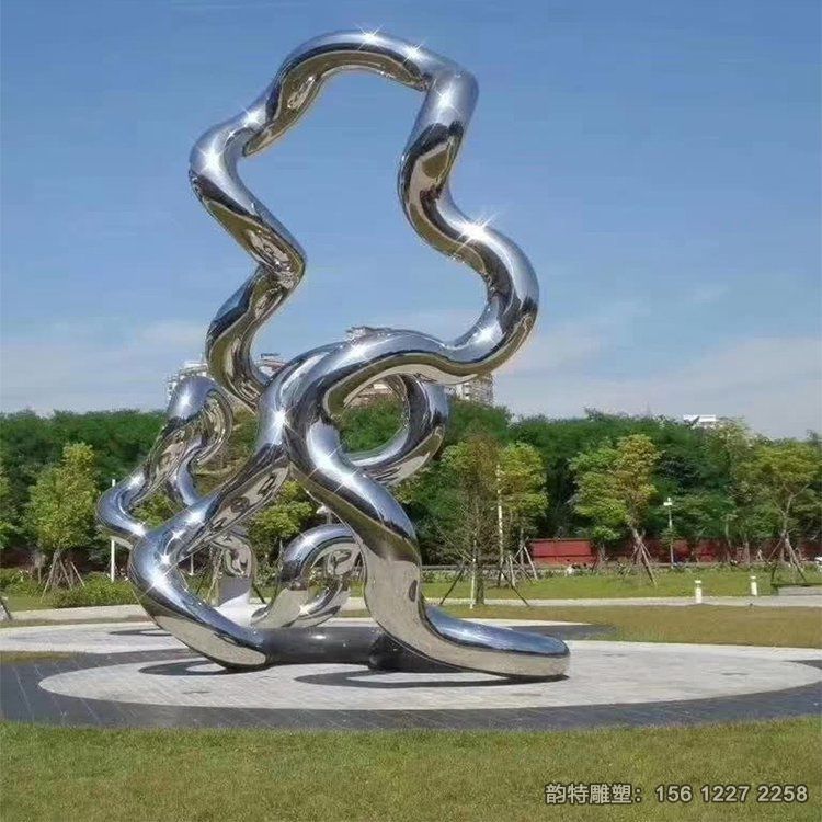 廣場不銹鋼鏡面飄帶雕塑，扭曲飄帶絲帶雕塑造型